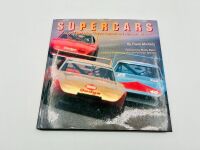 DODGE DAYTONA: Two 1:43 scale models of the Dodge Daytona by Universal Hobbies, together with a hardcover book 'Supercars: The Story of the Dodge Charger Daytona and Plymouth Superbird' by Frank Moriarty [Location: Sydney] - 10