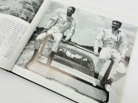 DODGE DAYTONA: Two 1:43 scale models of the Dodge Daytona by Universal Hobbies, together with a hardcover book 'Supercars: The Story of the Dodge Charger Daytona and Plymouth Superbird' by Frank Moriarty [Location: Sydney] - 13