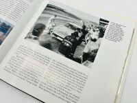 DODGE DAYTONA: Two 1:43 scale models of the Dodge Daytona by Universal Hobbies, together with a hardcover book 'Supercars: The Story of the Dodge Charger Daytona and Plymouth Superbird' by Frank Moriarty [Location: Sydney] - 14