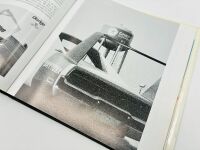 DODGE DAYTONA: Two 1:43 scale models of the Dodge Daytona by Universal Hobbies, together with a hardcover book 'Supercars: The Story of the Dodge Charger Daytona and Plymouth Superbird' by Frank Moriarty [Location: Sydney] - 15
