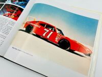 DODGE DAYTONA: Two 1:43 scale models of the Dodge Daytona by Universal Hobbies, together with a hardcover book 'Supercars: The Story of the Dodge Charger Daytona and Plymouth Superbird' by Frank Moriarty [Location: Sydney] - 16