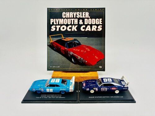 DODGE DAYTONA: Two 1:43 scale models of the Dodge Daytona by Universal Hobbies with display cases, together with a softcover book 'Chrysler, Plymouth & Dodge Stock Cars' by Dr. John Craft [Location: Sydney]