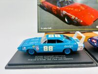 DODGE DAYTONA: Two 1:43 scale models of the Dodge Daytona by Universal Hobbies with display cases, together with a softcover book 'Chrysler, Plymouth & Dodge Stock Cars' by Dr. John Craft [Location: Sydney] - 3