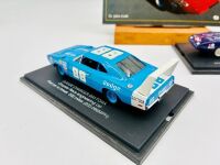 DODGE DAYTONA: Two 1:43 scale models of the Dodge Daytona by Universal Hobbies with display cases, together with a softcover book 'Chrysler, Plymouth & Dodge Stock Cars' by Dr. John Craft [Location: Sydney] - 4