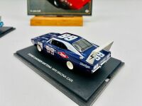 DODGE DAYTONA: Two 1:43 scale models of the Dodge Daytona by Universal Hobbies with display cases, together with a softcover book 'Chrysler, Plymouth & Dodge Stock Cars' by Dr. John Craft [Location: Sydney] - 7