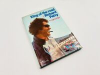 RICHARD PETTY: A group of Richard Petty items including a copy of 'King of the Road', signed by Richard Petty himself [Location: Sydney] - 2