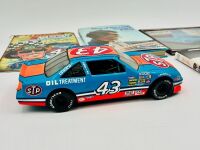 RICHARD PETTY: A group of Richard Petty items including a copy of 'King of the Road', signed by Richard Petty himself [Location: Sydney] - 12