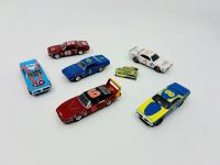 DODGE: Six 1:64 scale models of Dodge Stock Cars by Johnny Lightning and Lionel together with a badge [Location: Sydney]