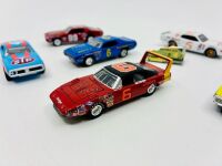 DODGE: Six 1:64 scale models of Dodge Stock Cars by Johnny Lightning and Lionel together with a badge [Location: Sydney] - 2