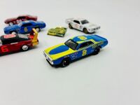 DODGE: Six 1:64 scale models of Dodge Stock Cars by Johnny Lightning and Lionel together with a badge [Location: Sydney] - 3