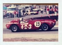 FERRARI: A pair of framed colour photos of the 375 Plus '0392 AM' being raced at Monterey, one with broken glass, 87cm x 64cm and 96cm x 74cm