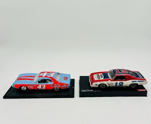 310 · SLOT CARS: Two 1:24 scale slot cars including a Dodge Charger and a Chevrolet Chevelle [Location: Sydney]