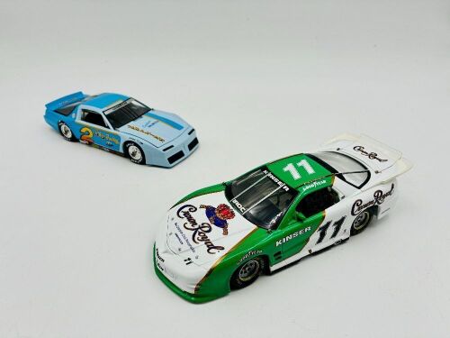 312 · PONTIAC FIREBIRD: Two 1:24 scale models by Action Racing Collectables including Mark Martin's 1983 Firebird and Steve Kinser's 2006 Crown Royal Series Firebird [Location: Sydney]
