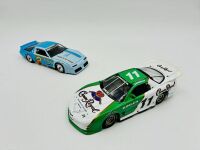 PONTIAC FIREBIRD: Two 1:24 scale models by Action Racing Collectables including Mark Martin's 1983 Firebird and Steve Kinser's 2006 Crown Royal Series Firebird [Location: Sydney]