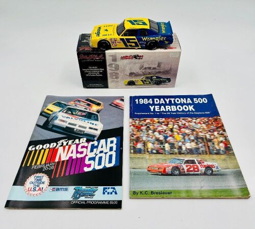 DALE EARNHARDT: A 1:24 scale model of Dale Earnhardt's 1979 Pontiac Ventura by Action Collectables together with an event programme and 'The 1984 Daytona 500 Yearbook' [Location: Sydney]