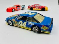 NASCAR: Five 1:24 scale 1990s Nascar models including two Ford Thunderbirds, a Chevrolet Lumina and an Oldsmobile Cutlass by Revell and a Chevrolet Monte Carlo by Racing Champions [Location: Sydney] - 4