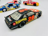 NASCAR: Five 1:24 scale 1990s Nascar models including two Ford Thunderbirds, a Chevrolet Lumina and an Oldsmobile Cutlass by Revell and a Chevrolet Monte Carlo by Racing Champions [Location: Sydney] - 7