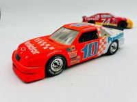 NASCAR: Five 1:24 scale 1990s Nascar models including two Ford Thunderbirds, a Chevrolet Lumina and an Oldsmobile Cutlass by Revell and a Chevrolet Monte Carlo by Racing Champions [Location: Sydney] - 8