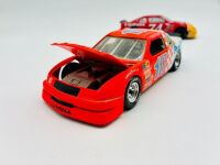 NASCAR: Five 1:24 scale 1990s Nascar models including two Ford Thunderbirds, a Chevrolet Lumina and an Oldsmobile Cutlass by Revell and a Chevrolet Monte Carlo by Racing Champions [Location: Sydney] - 9