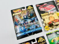 NASCAR: Seven 1:64 scale Nascar models from the 1990s and early 2000's by Racing Champions and Hot Wheels, all in original packaging [Location: Sydney] - 2