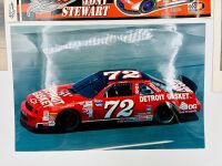 NASCAR: A group of Nascar items including two 1:43 scale models, two framed prints, a novelty licence plate, four unframed photos, seven stickers and four posters [Location: Sydney] - 6