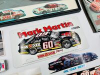 NASCAR: A group of Nascar items including two 1:43 scale models, two framed prints, a novelty licence plate, four unframed photos, seven stickers and four posters [Location: Sydney] - 7