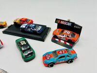 NASCAR: A group of 17 1:64 scale Nascar models from the 1990s and early 2000s by Racing Champions [Location: Sydney] - 6
