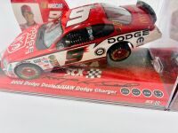 KASEY KAHNE: Three 1:32 scale Nascar slot cars by SCX including one signed model together with a signed photograph [Location: Sydney] - 7