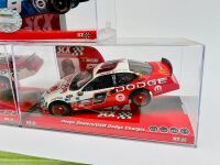 KASEY KAHNE: Three 1:32 scale Nascar slot cars by SCX including one signed model together with a signed photograph [Location: Sydney] - 13