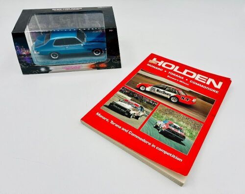 HOLDEN: A 1:24 scale Holden Torana by DDA Collectibles with original packing and a softcover book 'Holden: Monaro, Torana and Commodore in Competition' by Stewart Wilson [Location: Sydney]