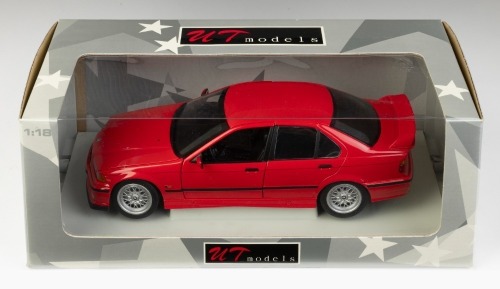 BMW: A 1:18 scale UT models 1996 BMW 318is model, product number 180 024302