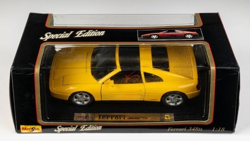 61 · FERRARI: A Maisto 1:18 scale 1990 Ferrari 348ts model, model number 31804