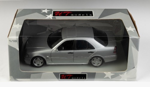 MERCEDES BENZ: A 1:18 scale UT models 1997 Mercedes Benz C36 AMG model, product number 180 035000