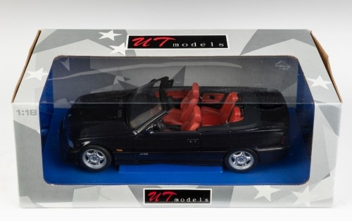 74 · BMW: A 1:18 scale UT models BMW M3 cabriolet model, product number 180 022330