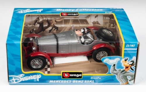 MERCEDES BENZ: A Bburago 1:18 scale Mercedes Benz SSKL model, in full Disney packaging with a Goofy figurine, model number 2102