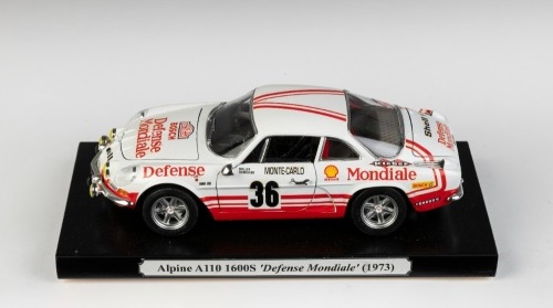 106 · ALPINE: A 1:18 scale Bburago 1973 Alpine A110 1600s 'Defense Mondiale' Monte Carlo Rally car model