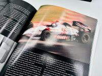 MARIO ANDRETTI: A group of items showcasing Mario Andretti's Indy Car career [Location: Sydney] - 9