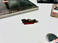 MARIO ANDRETTI: A group of items showcasing Mario Andretti's Indy Car career [Location: Sydney] - 16