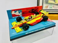 TONY STEWART: A 1:43 scale model Lola 95 by Minichamps signed by Tony Stewart with a framed picture [Location: Sydney] - 2