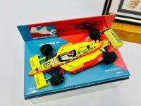 TONY STEWART: A 1:43 scale model Lola 95 by Minichamps signed by Tony Stewart with a framed picture [Location: Sydney] - 5