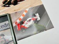 INDY CAR: Six photos including two framed items signed by Al Unser Jr and Tony Bettenhausen, together with a 1:64 scale model by Johnny Lightning [Location: Sydney] - 7