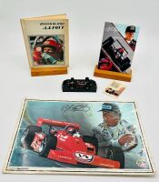 A.J. FOYT: Five A.J. Foyt Indycar items including a hardcover book, a media guide, a 1:43 scale model, a trading card and a poster [Location: Sydney]
