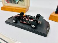 A.J. FOYT: Five A.J. Foyt Indycar items including a hardcover book, a media guide, a 1:43 scale model, a trading card and a poster [Location: Sydney] - 3