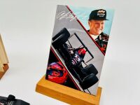 A.J. FOYT: Five A.J. Foyt Indycar items including a hardcover book, a media guide, a 1:43 scale model, a trading card and a poster [Location: Sydney] - 5
