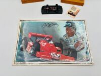 A.J. FOYT: Five A.J. Foyt Indycar items including a hardcover book, a media guide, a 1:43 scale model, a trading card and a poster [Location: Sydney] - 8