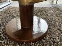 PROPELLOR: A large decorative solid brass ships propellor mounted on timber base, under circular bevel cut glass table top - 5