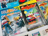 INDY CAR GOLD COAST: Eleven event programs for the Indy Car Gold Coast race together with stickers and a badge [Location: Sydney] - 2