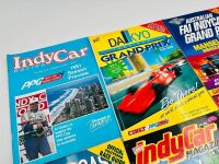 INDY CAR GOLD COAST: Eleven event programs for the Indy Car Gold Coast race together with stickers and a badge [Location: Sydney] - 3