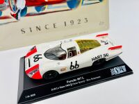 LE MANS: A 1:32 scale slot car by SRC of the Porsche 907 L driven in the 1968 24 Hours of Le Mans together with a metal sign, 40cm long, 30 cm wide [Location: Sydney] - 2