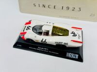 LE MANS: A 1:32 scale slot car by SRC of the Porsche 907 L driven in the 1968 24 Hours of Le Mans together with a metal sign, 40cm long, 30 cm wide [Location: Sydney] - 3